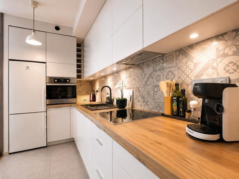 Kitchen or kitchenette, dishwasher, oven, stove, washing machine, kitchen
