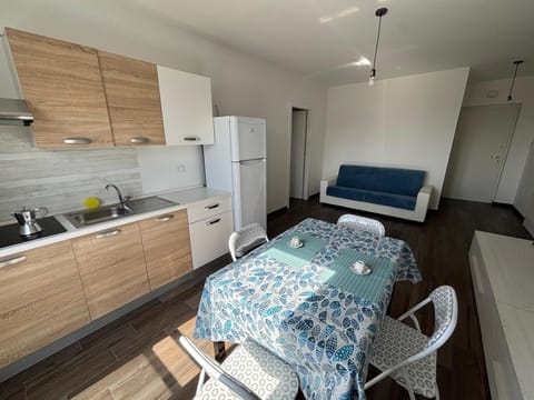 Kitchen or kitchenette, Living room, Dining area, stove