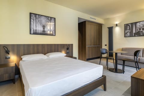 Bed, Living room, Seating area, wardrobe, kitchen