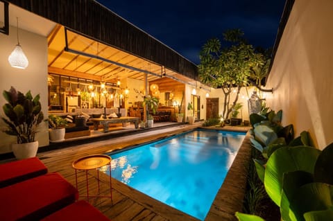 Property building, Patio, Night, Pool view, Swimming pool, sunbed