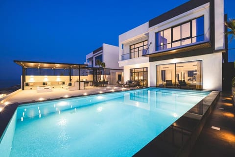 Property building, Patio, Night, Pool view, Swimming pool, sunbed