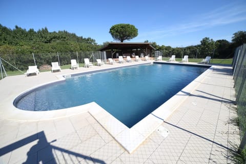 Property building, Living room, Swimming pool