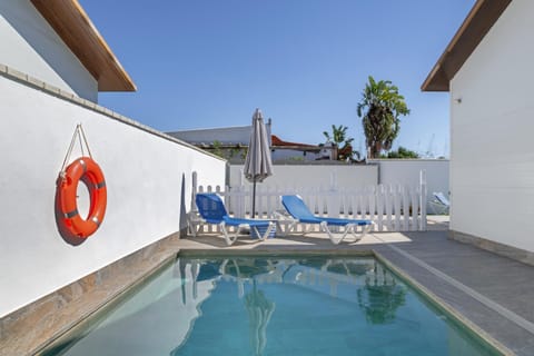 Property building, Living room, Swimming pool