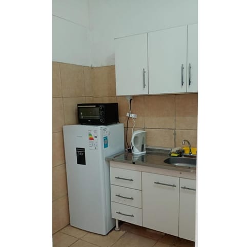 Kitchen or kitchenette, oven