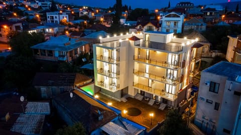 Property building, Night, Neighbourhood, Bird's eye view, City view, Street view, Location, Parking