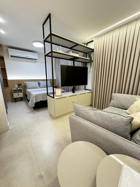 Communal lounge/ TV room, Bed, TV and multimedia, Living room, Seating area, Bedroom