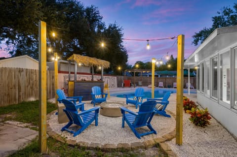 Resort Style Backyard Tiki Bar Pool Hot Tub House in Pinellas Park