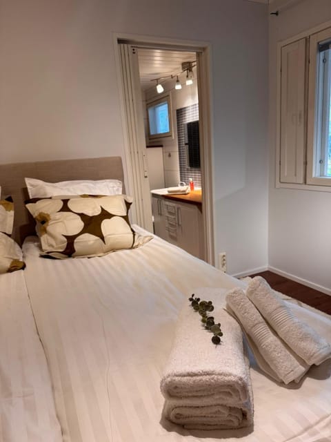 Toilet, Bed, towels, wardrobe