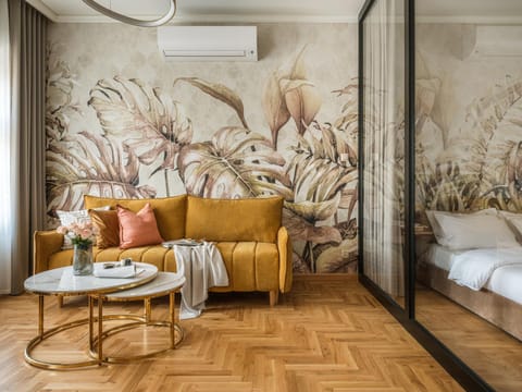 Bed, Living room, Seating area, air conditioner