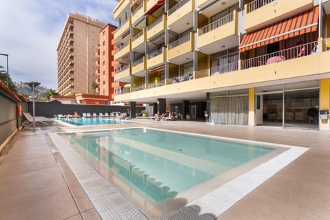 Property building, Living room, Swimming pool