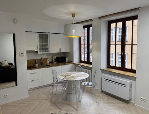 Kitchen or kitchenette, stove, air conditioner