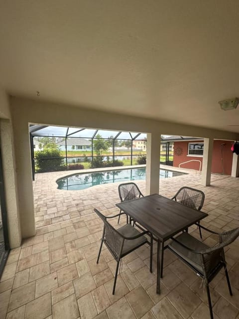 Patio, View (from property/room), Balcony/Terrace, Seating area, Dining area, Pool view, Swimming pool