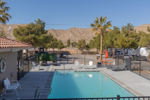 Property building, Patio, Day, Natural landscape, Mountain view, Pool view, Swimming pool, sunbed