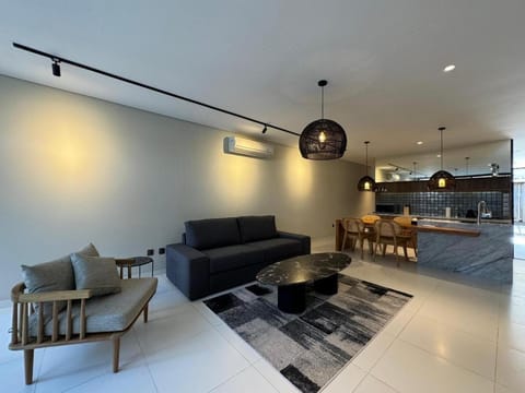 Kitchen or kitchenette, Living room, Seating area, Dining area