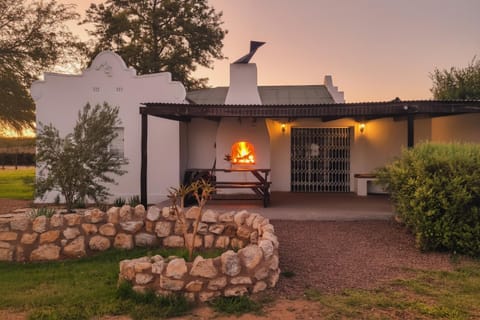 Property building, Patio, BBQ facilities, Seating area
