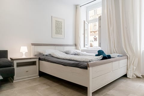 Bed, Seating area, Bedroom