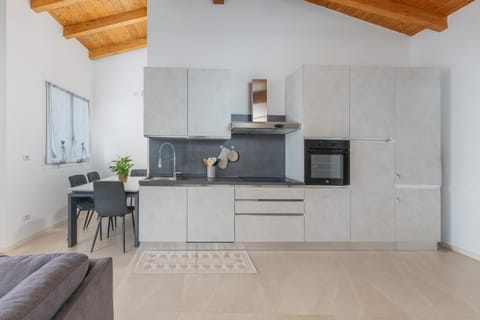 Kitchen or kitchenette, oven, stove