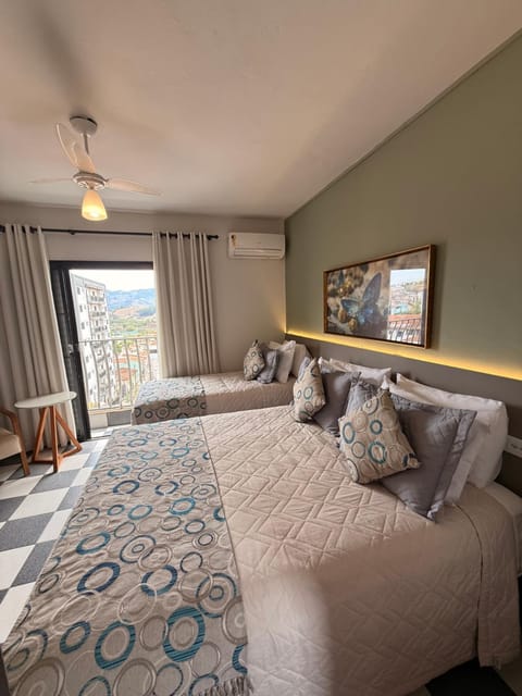 City view, minibar, safe, air conditioner