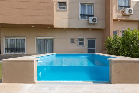 Property building, Day, Pool view, Swimming pool