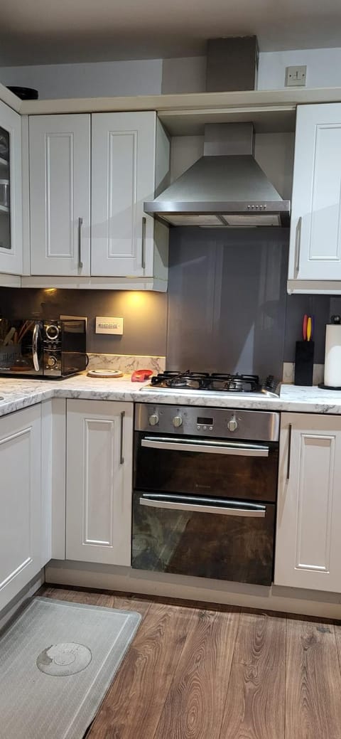 Kitchen or kitchenette, stove