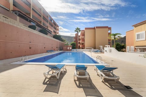 Property building, Living room, Swimming pool