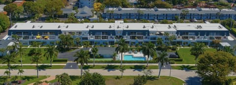Belair Lane condo community pool managed by Sky Run Naples Apartment in Naples