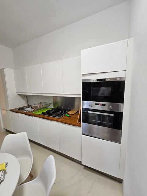 Kitchen or kitchenette, oven, stove