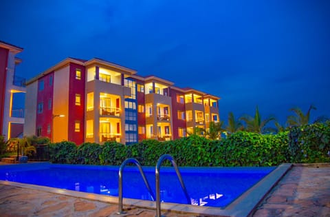 Property building, Night, Pool view, Swimming pool, Swimming pool, sunbed