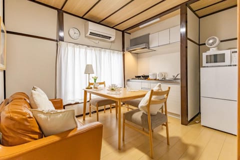 Kitchen or kitchenette, Seating area, Dining area, stove, air conditioner