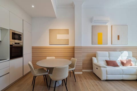 Kitchen or kitchenette, Living room, Dining area, microwave, oven, air conditioner