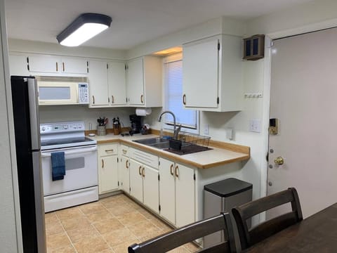 Kitchen or kitchenette, oven, stove