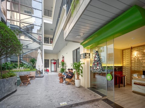 Property building, Day, Lobby or reception, Seating area, Garden view