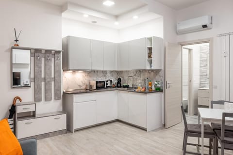 Kitchen or kitchenette, microwave, washing machine, kitchen