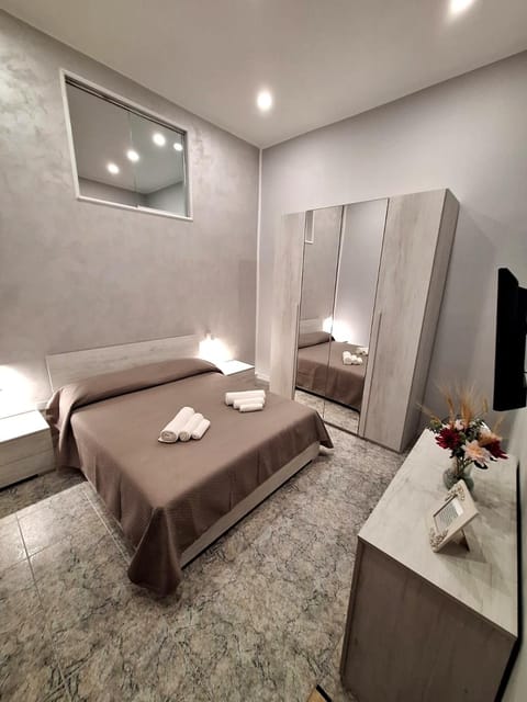 Bed, TV and multimedia, Bedroom, towels, wardrobe