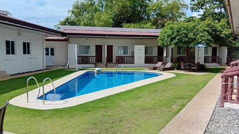 Swimming pool, sunbed