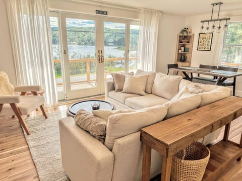 View (from property/room), Living room, Seating area, Lake view