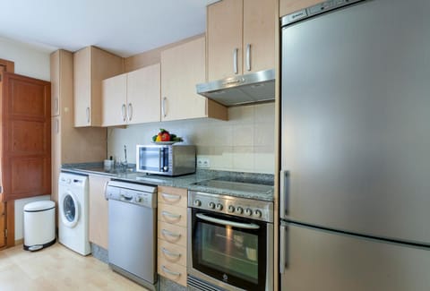 Kitchen or kitchenette, dishwasher, oven, toaster, washing machine