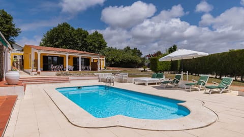 Swimming pool, sunbed