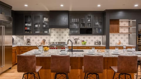 Seating area, storage, stove, toaster, kitchen