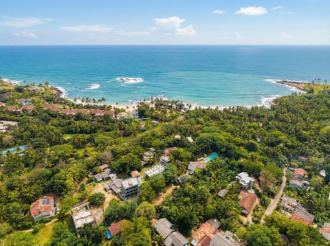 Property building, Nearby landmark, Day, Natural landscape, Beach, Sea view