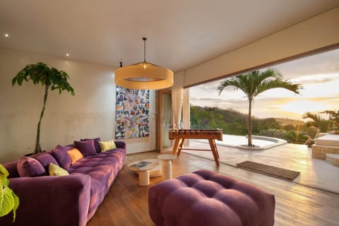 Living room, Seating area, Garden view, Pool view, Sunset