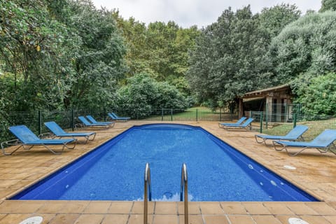 Property building, Living room, Swimming pool