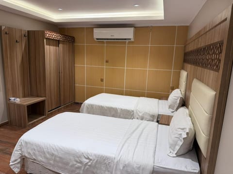 Bed, Photo of the whole room, Bedroom, towels, wardrobe, air conditioner