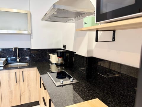 Kitchen or kitchenette, stove