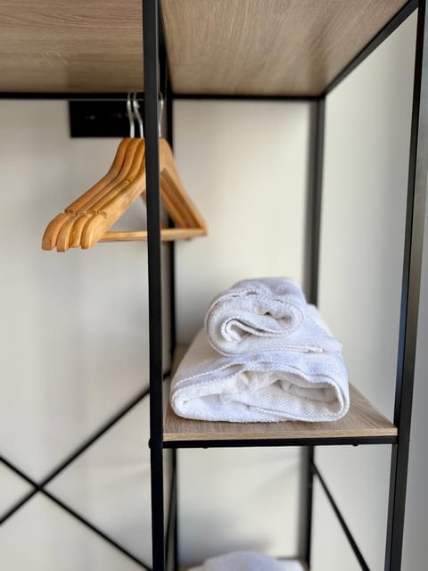 Bed, Photo of the whole room, Bedroom, bunk bed, towels, wardrobe