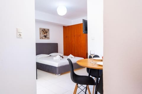 Bed, Dining area, wardrobe