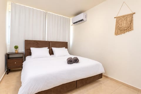 Bed, Photo of the whole room, Bedroom, towels, air conditioner