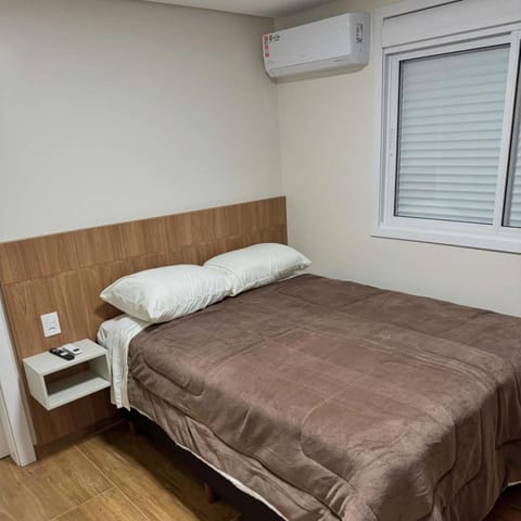 Bed, air conditioner