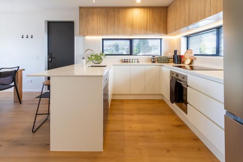 Kitchen or kitchenette, dishwasher, oven, stove