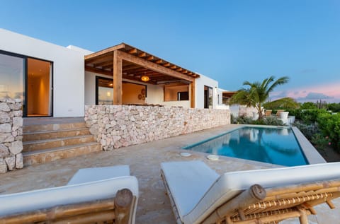 Property building, Seating area, Swimming pool, sunbed